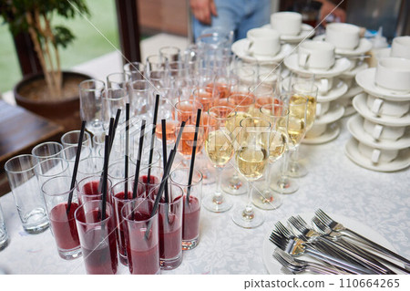 light snacks for the holiday, catering. Various light snacks. Catering plate. Assortment of sandwiches on the buffet table. meat, fish, vegetable canapes. 110664265