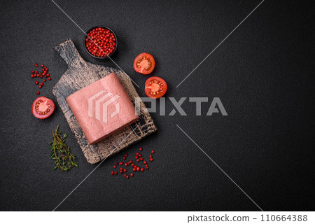 Delicious canned pink ham with salt, spices and herbs Delicious canned pink ham with salt, spices and herbs 110664388