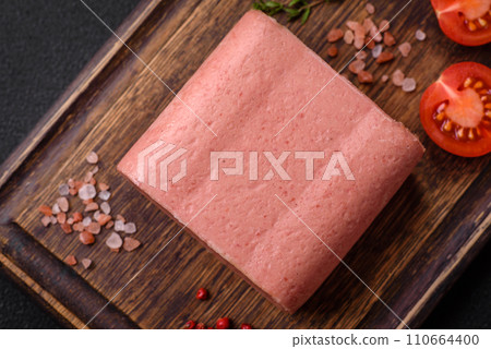 Delicious canned pink ham with salt, spices and herbs 110664400