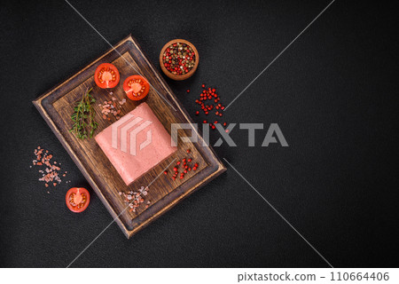 Delicious canned pink ham with salt, spices and herbs Delicious canned pink ham with salt, spices and herbs 110664406