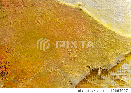 The bright texture of the canvas, painted in orange-yellow colors with shades. 110665607