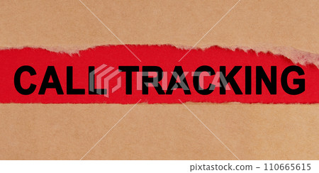 Among the torn sheets of paper on a red background, the inscription - Call Tracking Among the torn sheets of paper on a red background, the inscription - Call Tracking 110665615