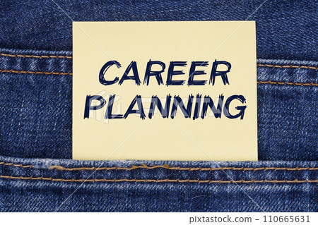 There is a paper sticking out of a jeans pocket with the inscription - Career Planning 110665631