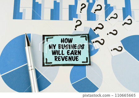 On the blue diagrams lies a pen, questions and a sticker with the inscription - How my Business Will Earn Revenue On the blue diagrams lies a pen, questions and a sticker with the inscription - How my Business Will Earn Revenue 110665665