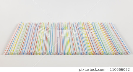 Background made of plastic straws for juice and drinks. Plastic straws. Straws for drinks. Background made of plastic straws for juice and drinks. Plastic straws. Straws for drinks. 110666052