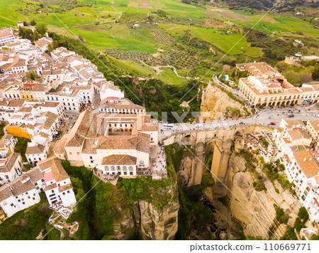 Ronda landscape and buildings with Puente Nuevo Bridge, Andalusia, Spain 110669771