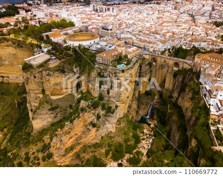 Rocky landscape of Ronda city with Puente Nuevo Bridge and buildings Rocky landscape of Ronda city with Puente Nuevo Bridge and buildings 110669772