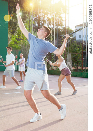 Young man playing frontenis on outdoor pelota court Young man playing frontenis on outdoor pelota court 110669861