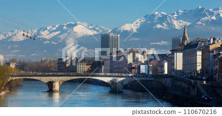 Cityscape of Grenoble with cable car and snowy Alps Cityscape of Grenoble with cable car and snowy Alps 110670216