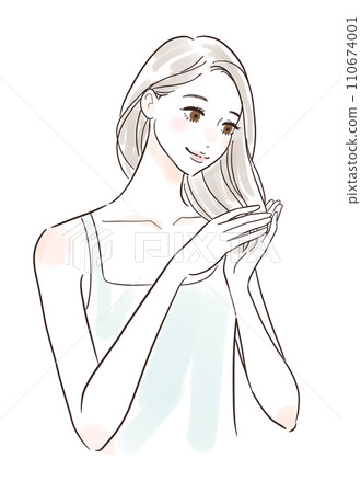 A woman caring for her hair with a smile 110674001