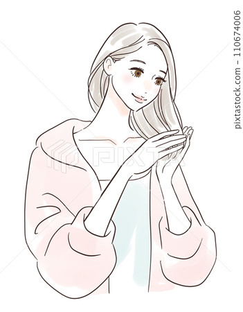 A woman caring for her hair with a smile A woman caring for her hair with a smile 110674006