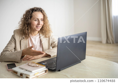 Modern business woman working online use laptop making notes e learning distance education at home 110674488