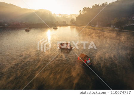 Rowing boat on the reservoir in the morning 110674757