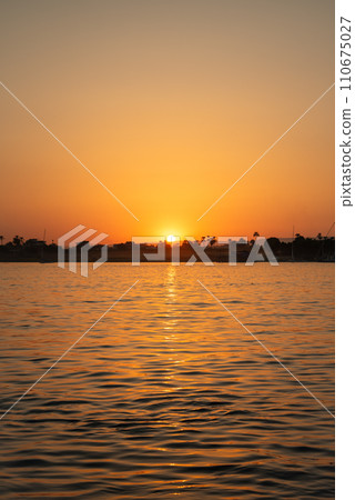 Beautiful sunset scenery on the Nile River in Egypt Beautiful sunset scenery on the Nile River in Egypt 110675027