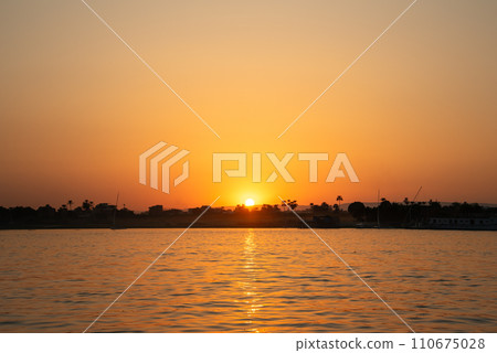 Beautiful sunset scenery on the Nile River in Egypt Beautiful sunset scenery on the Nile River in Egypt 110675028