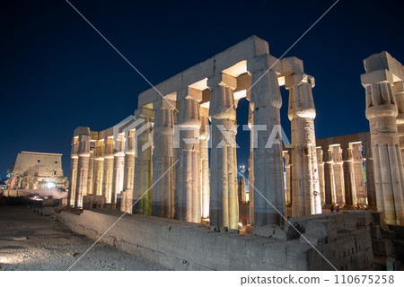 Beautifully illuminated night view of Luxor temple in Egypt Beautifully illuminated night view of Luxor temple in Egypt 110675258