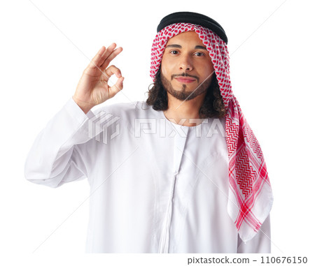 Smiling Arab businessman showing ok sign isolated on white background 110676150