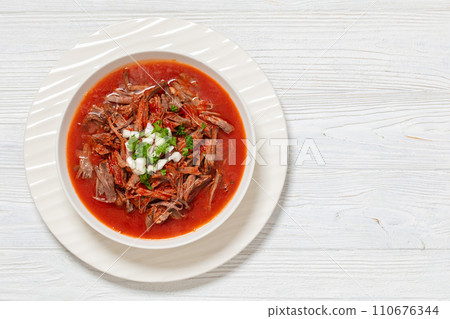 birria de res, mexican beef stew in pepper sauce birria de res, mexican beef stew in pepper sauce 110676344
