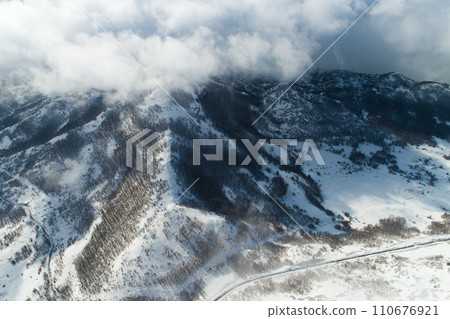 winter mountain road form above winter mountain road form above 110676921