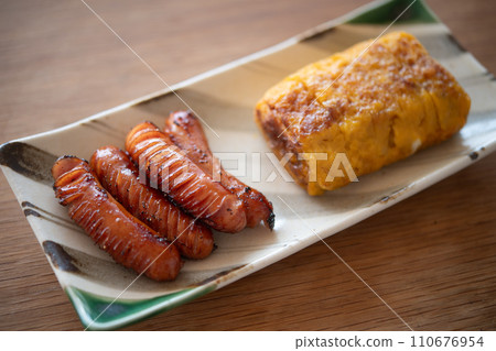 fried egg and sausage fried egg and sausage 110676954
