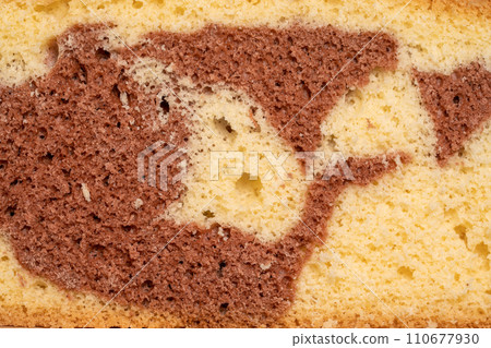 Two-color sponge cake texture. Macro shot of cake cut. 110677930