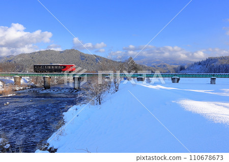 ``Akita Matagi'' running through a snowy landscape 110678673