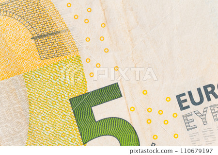 fragment of five Euro bill. 5 euro banknote close-up. fragment of five Euro bill. 5 euro banknote close-up. 110679197