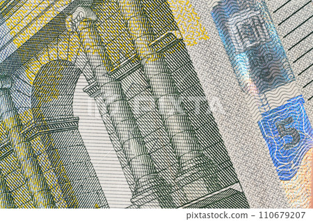 fragment of five Euro bill. 5 euro banknote close-up. fragment of five Euro bill. 5 euro banknote close-up. 110679207