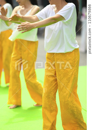 Women doing hula dancing Women doing hula dancing 110679866