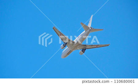 jet airliner flying over the sky 110680001