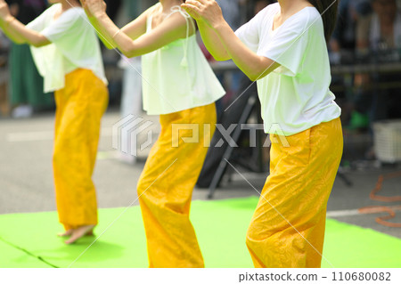 Women doing hula dancing Women doing hula dancing 110680082