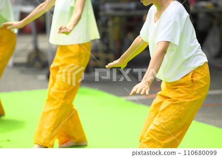 Women doing hula dancing Women doing hula dancing 110680099