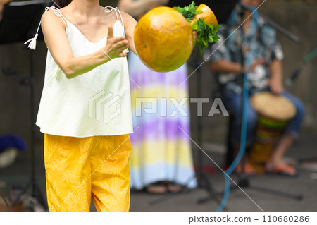 Women doing hula dancing 110680286
