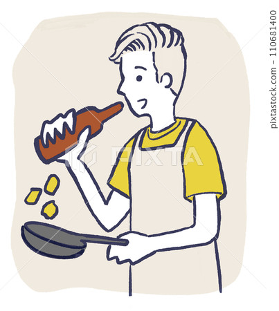 一個男人一邊喝啤酒一邊做飯 一個男人一邊喝啤酒一邊做飯 110681400