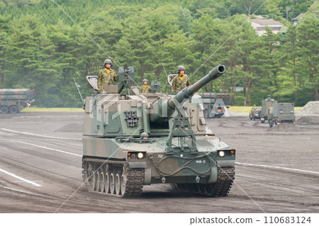 Japan Ground Self-Defense Force Type 99 self-propelled 155mm howitzer in motion Japan Ground Self-Defense Force Type 99 self-propelled 155mm howitzer in motion 110683124