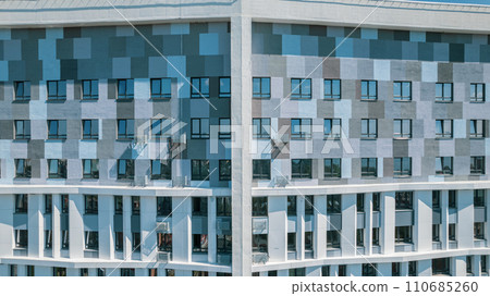 Facade of a modern residential building, building texture 110685260