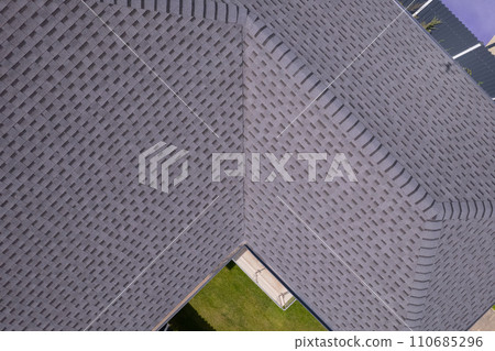 Shingles texture - close up view of asphalt roofing shingles Shingles texture - close up view of asphalt roofing shingles 110685296