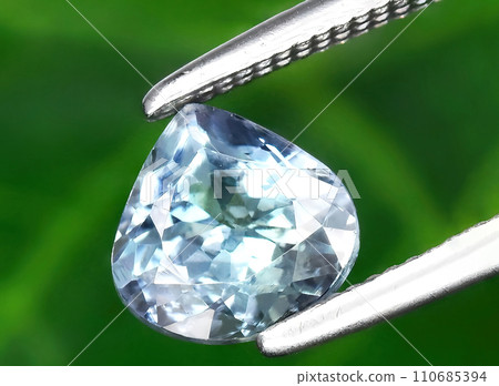natural blue tanzanite gem on the background 110685394