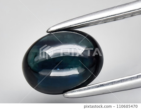 natural blue sapphire gem on the background 110685470