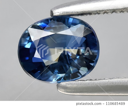 natural blue sapphire gem on the background 110685489