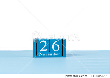 Wooden calendar November 26 on a white background 110685636