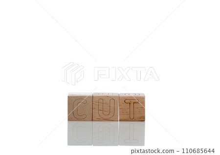 Wooden cubes with letters cut on a white background 110685644