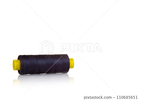 skein of thread purple colors macro on a white background 110685651