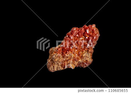 Macro mineral stone Vanadinite on a black background 110685655
