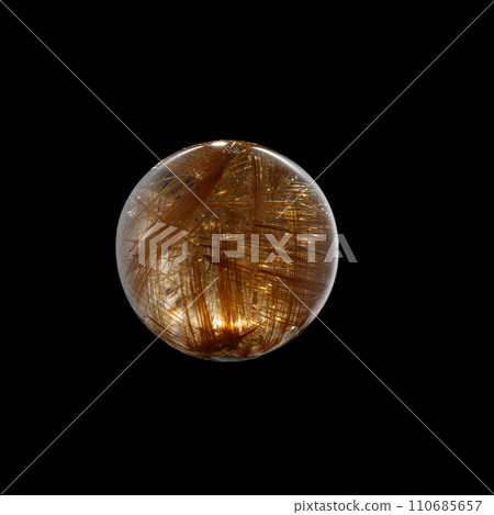 Ball of quartz with rutile on a black background 110685657