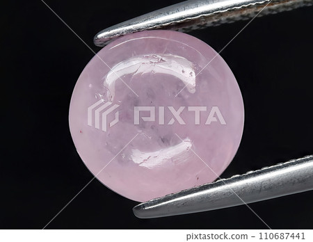 natural pink morganite beryl gem on the background natural pink morganite beryl gem on the background 110687441