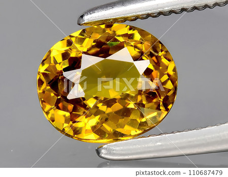 natural yellow grossular gem on the background natural yellow grossular gem on the background 110687479