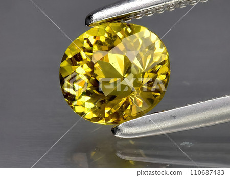 natural yellow grossular gem on the background natural yellow grossular gem on the background 110687483