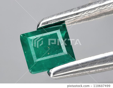 natural green dioptase gem on the background natural green dioptase gem on the background 110687499