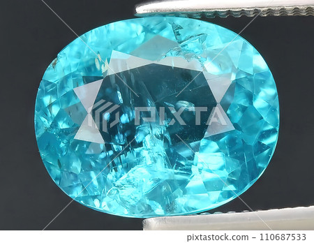 natural blue apatite gem on the background natural blue apatite gem on the background 110687533
